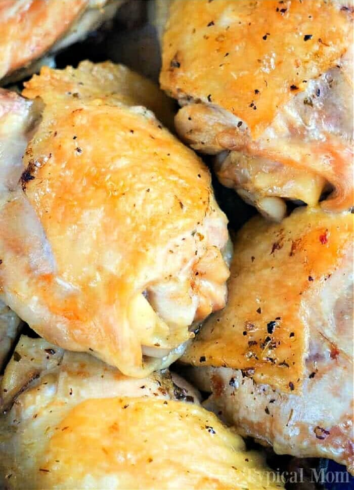 Close-up of golden-brown instant pot chicken thighs with crispy skin and seasoning, showcasing an easy recipe for delightful instant pot chicken.